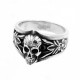 Skull ring surrounded by flowers